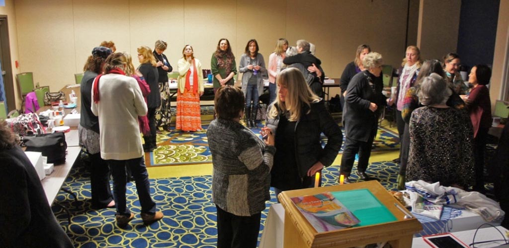 A few of the women stop on the bridge after enjoying dinner